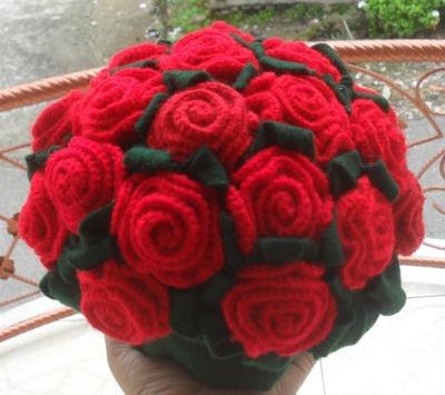 Hand-knitted red roses