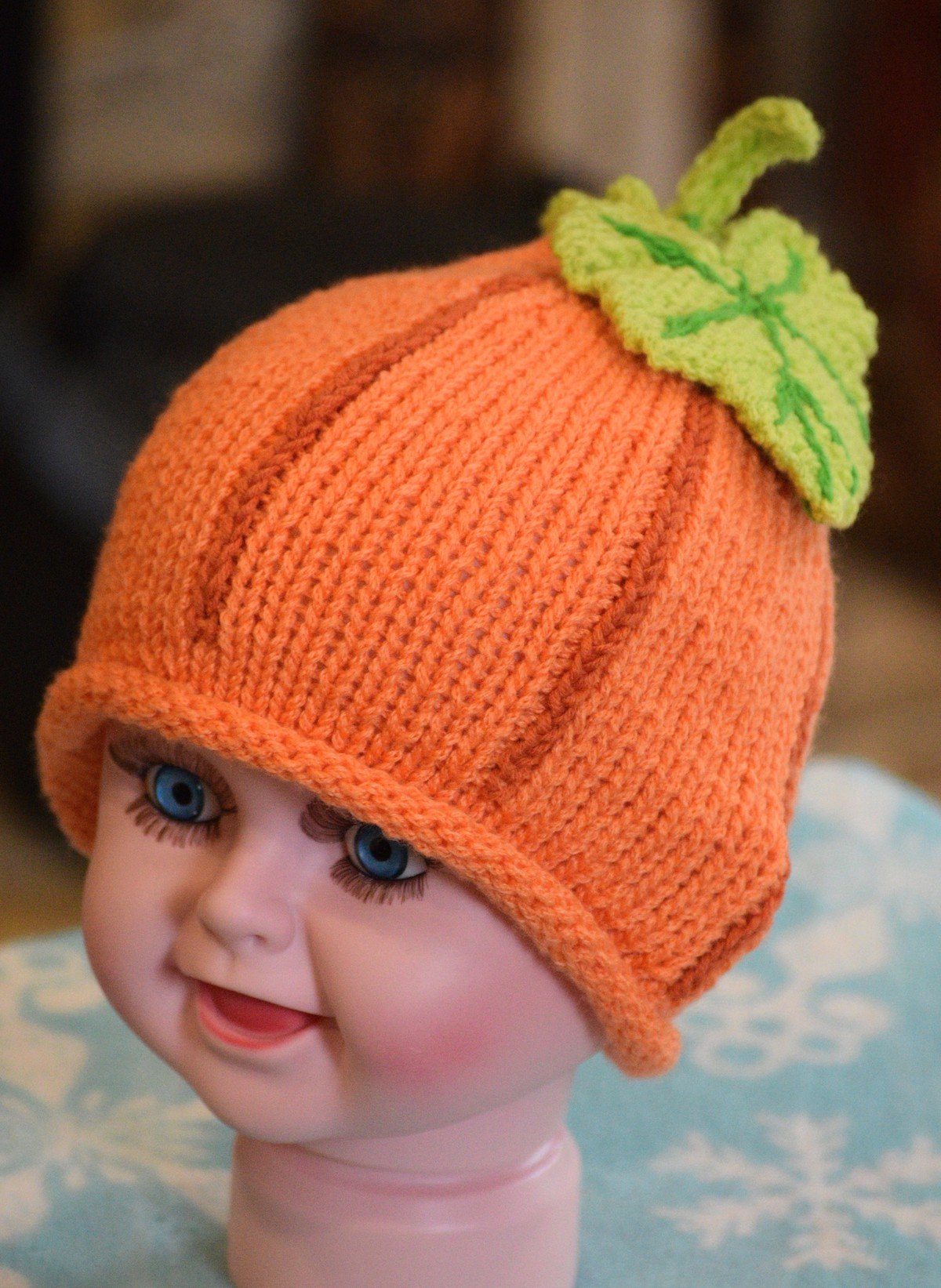 Give your child this adorable pumpkin hat for this Fall.  It's quite easy to make and you will whip this up in no time.  One skein of yarn make 2 hats.