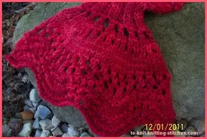 This Feather and Fan neck scarf is knitted with a 50 gram ball wool.  Beautiful and make a great gift for your love one.