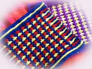 These 3 color-pot holders knitting patterns are very pretty and useful in the kitchen.  Each pad is knitted using 3 different yarns in a texture pattern. 