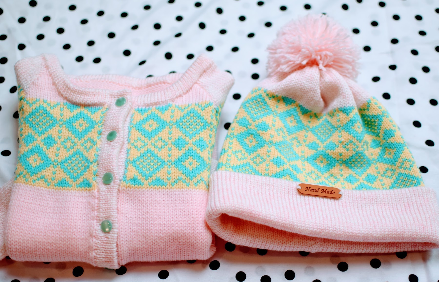 This is a girl fair isle cardigan with a matching hat.  Made to fit a child 3-5 years of age.  It comes with a matching hat.  