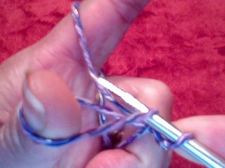 long tail cast on- right needle over yarn on index