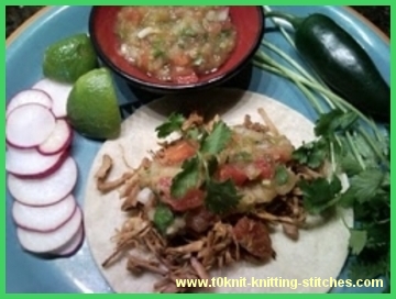 slow cooked pork taco with green salsa