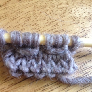 knit wrap yarn around 3 sts over 6 sets